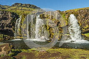 Wonderful waterfal Kirkjufellsfossl in Iceland, summer time