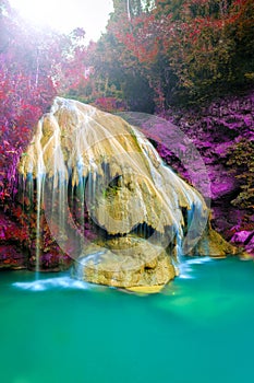 Wonderful waterfall with colorful tree in thailand