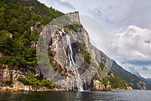 Wonderful waterfall in the Norwegian fjord