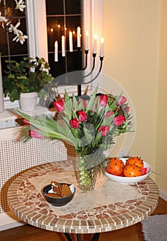 Christmas oranges with cloves on a plate