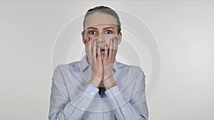 Wondering Young Businesswoman in Shock on White Background