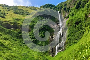 wonderous waterfall cascading down the mountainside photo