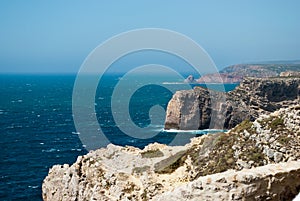 Cabo de Sao Vicente in Portugal with a rock that looks just like one to a shoe photo