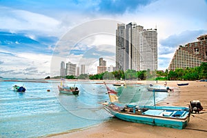 Wong Amat Beach - coastline landscape with hotels and boats against the blue sky photo