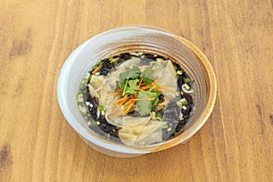 Wonton soup is a Chinese soup, and popular in the chifa cuisine photo