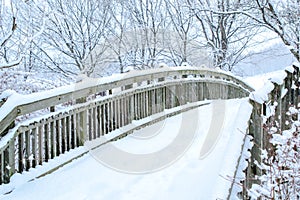 Woo bridge with background snow on winter photo