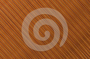 Wood abstract background, texture veneer ribbed walnut colors endless parallel