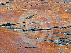 old brown wooden tabletop texture background, surface teak tables with large cracks and scratches