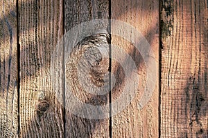 Wood barn wall plank texture background with light and shadow in the morning day, top view of old table