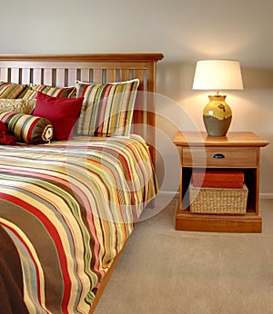 Wood bed and nightstand with stripes