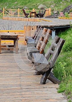 The wood bench on pavement board