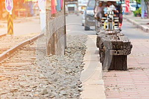 Wood bench with railway in city photo