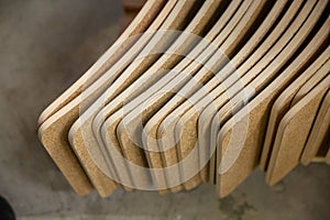 Wood billets are stacked in a carpentry workshop