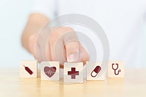 Wood block with icon healthcare medical