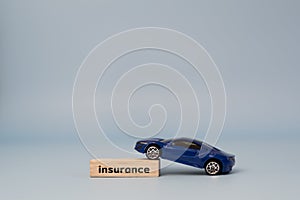 Wood block insurance car business finance service support concept