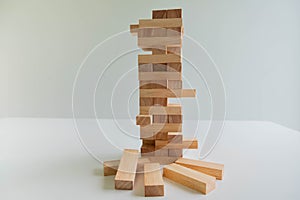 Wood block tower with architecture model, Planning Alternative Risk and Strategy in Business concept