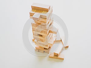 Wood block tower with architecture model, Planning Alternative Risk and Strategy in Business concept