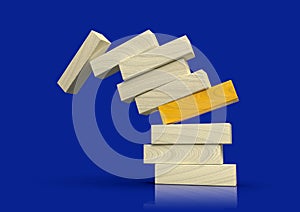 Wood blocks stack falling, after one is pulled, metaphor