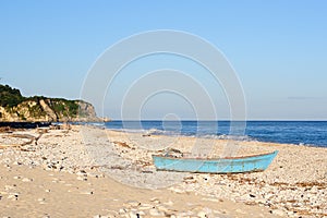 Wood boat on the beach Dominican Republic