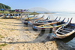 Wood boat Myanmar style at Ubein bridge.