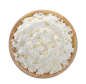 Wood bowl full of rice on white background