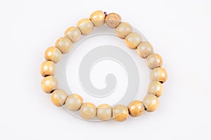 Wood bracelet beads on white background