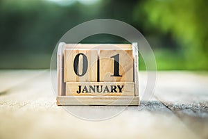 Wood brick block show date and month calendar of 1st January or New year day.