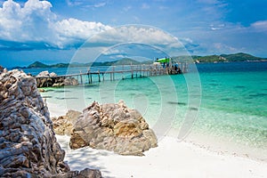 Wood bridge on the beach with water and blue sky. Koh kham pattaya thailand