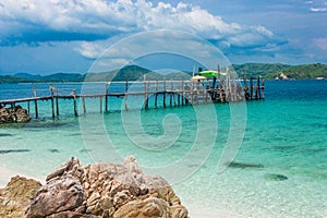 Wood bridge on the beach with water and blue sky. Koh kham pattaya thailand