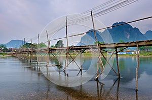 Wood bridge over river song, Vang vieng, Laos