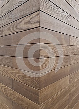 wood building facade decoration, house corner, ash tree