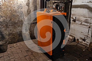 Wood burning boiler in boiler room