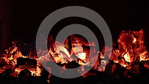 Wood burning stove of country house, ember smolder after burning firewood.