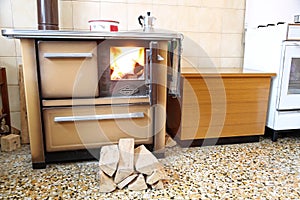 Wood-burning stove in the kitchen of a home photo