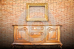 Wood cabinet and gold frame