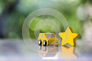 Wood car and wood star for scoring satisfaction surveys