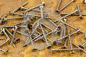 Wood carpenter construction screws pile scattered