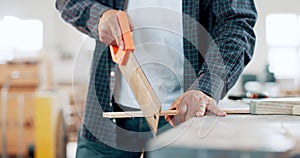 Wood, carpenter and hands in workshop with saw, tools and construction process in garage closeup. Building, project and