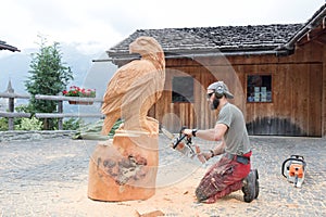 Wood carver making an eagle