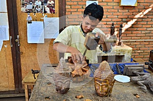 Wood carver at work