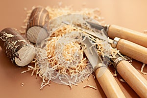 Wood carving close-up with sawdust