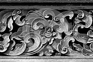 Wood carving decorated at windows of the temple