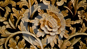 wood carving, floral pattern carved on wooden background. gebyok.