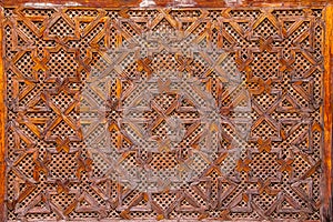 Wood carving of geometry islamic pattern - Morocco