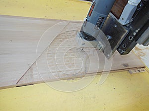 Wood carving machine with computer system. Traditional pattern wood carving with machine