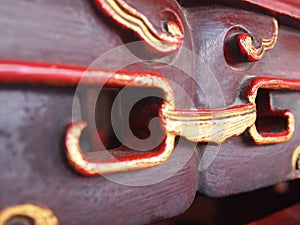 Wood carving patterns on the Chinese border.