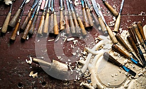 Wood carving tools on worktable