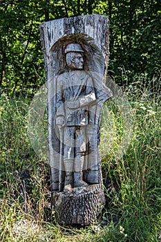 Wood carvings in the forest photo