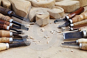 Wood carvings, tools and processes work closeup