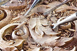 Wood carvings, tools and processes work closeup